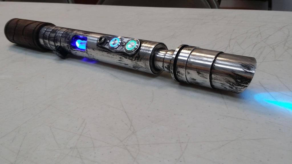 new_custom_lightsaber_by_rusten-daamjgb.jpg
